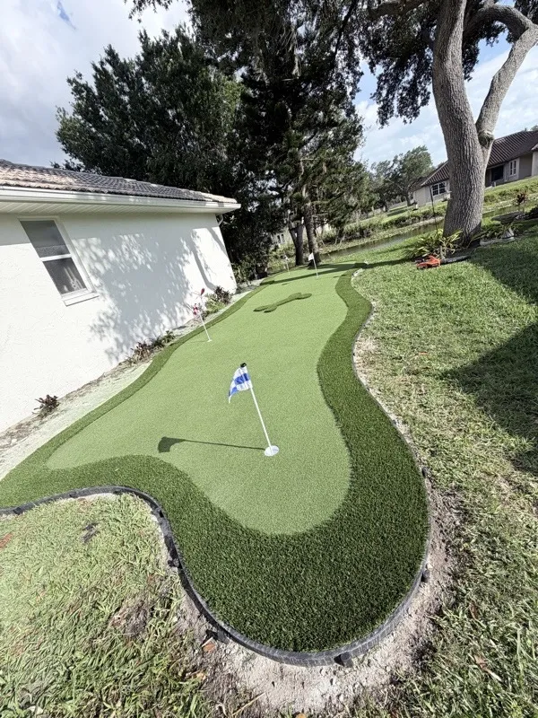 Backyard putting green by Master360 Services in St. Petersburg, FL