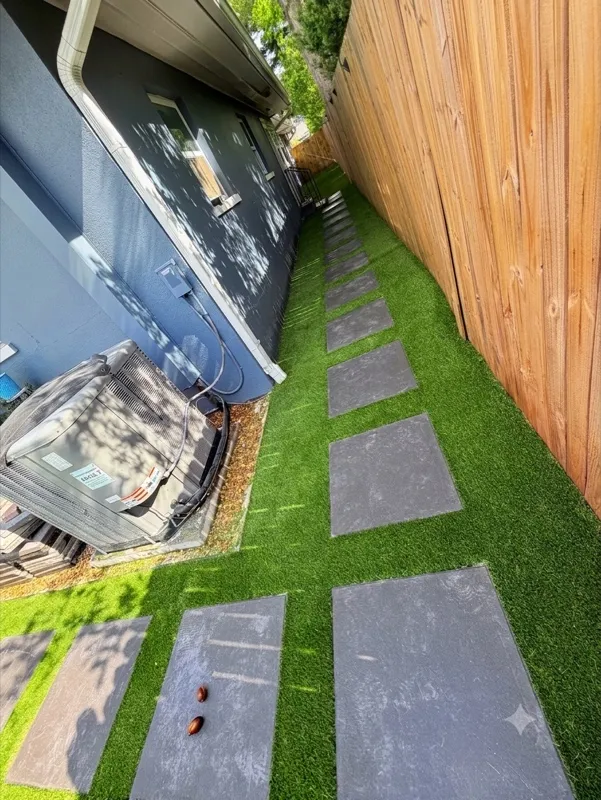 Artificial turf and paver hardscape by Master360 Services in Sarasota, FL