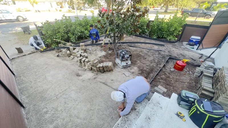 Paver and travertine hardscape by Master360 Services in Palmetto, FL